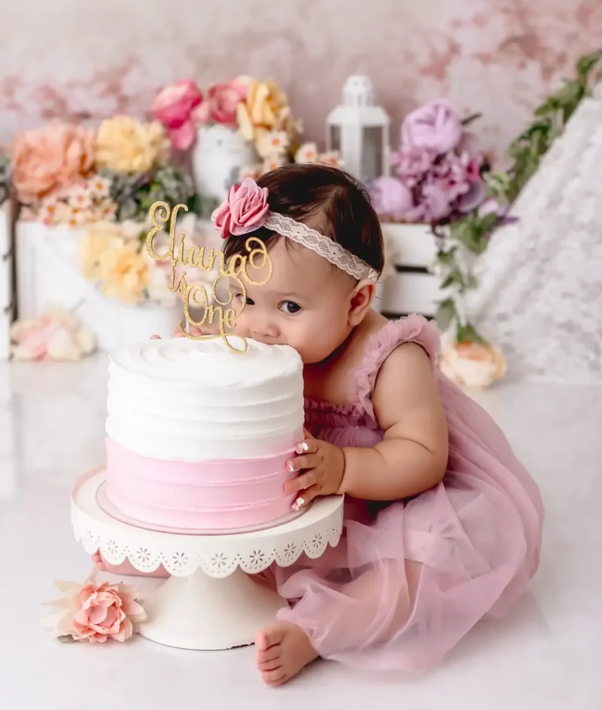 A Smash Cake Photo Set Built From Flowers, Lace and One White Lantern