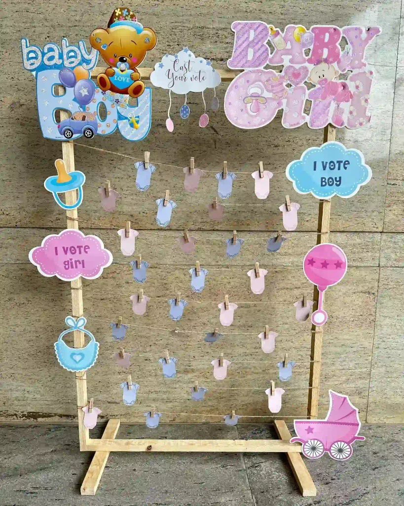 A Boy or Girl Vote Wall Made of Clothespin Onesies