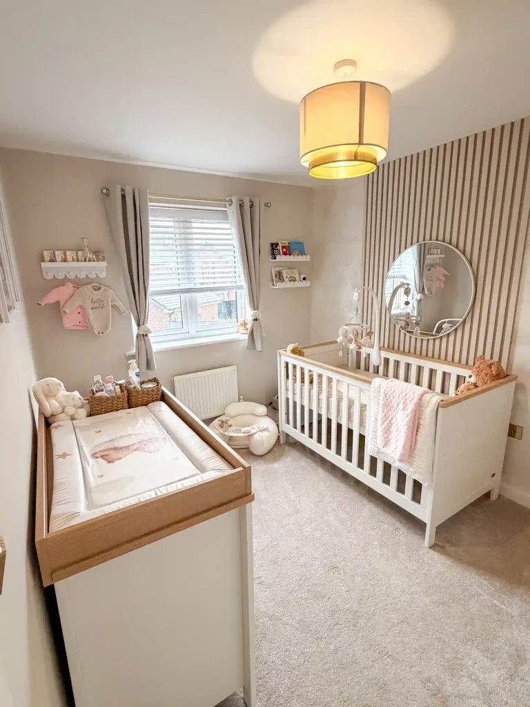 Slat Wall and Round Mirror for a Small Nursery