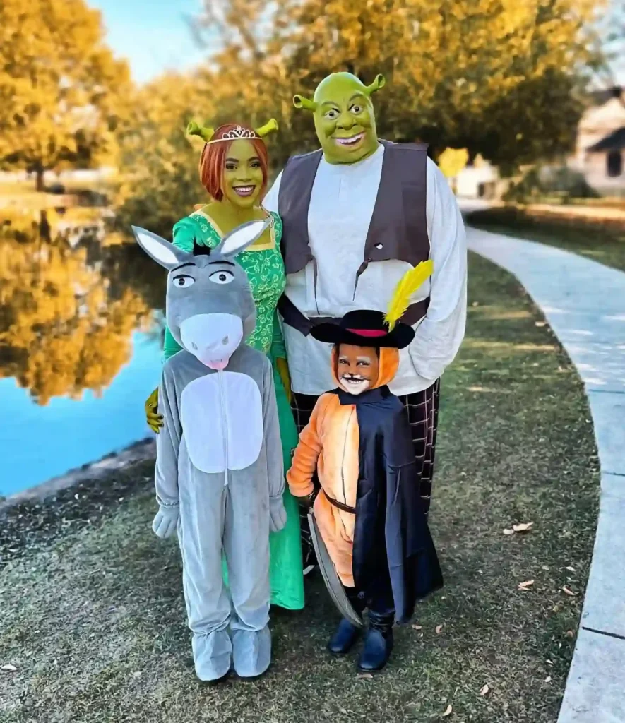 Shrek, Fiona, Donkey, and Puss in Boots by the Pond