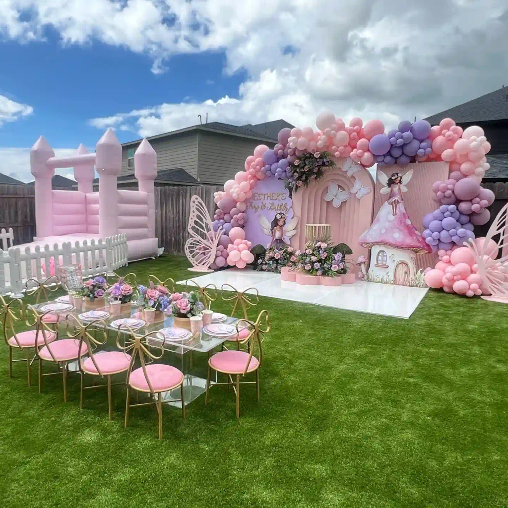 A Pink and Lilac Fairy Garden With a Bouncy Castle