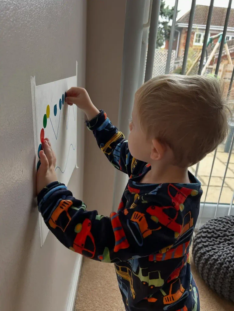 Sticker Dot Lines on a Taped Paper Wall