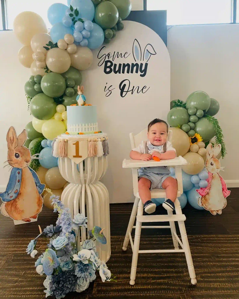 Storybook First Birthday Party Ideas With a Rabbit Garden Photo Spot
