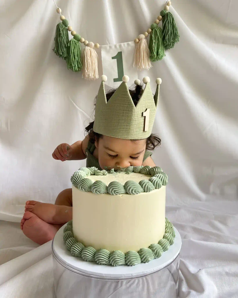 A Sage Green Crown, a Tassel Garland and a Face in the Cake