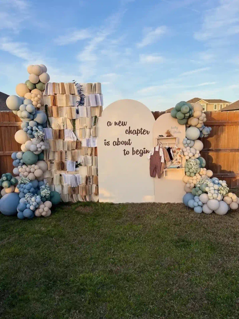 Baby shower themes for boys: A New Chapter Book Wall Gives Your Shower a Story to Tell